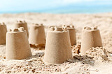 sandcastles on the sand of a beach