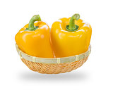 Fresh yellow bell peppers in basket