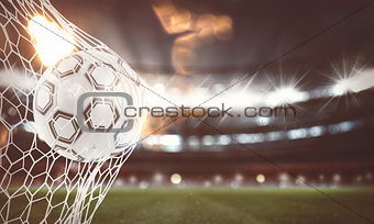 Soccer ball scores a goal on the net. 3D Rendering