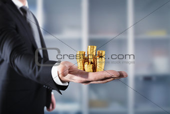Businessman hold piles of money. Concept of success and company growth