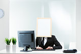 Businessman with a blank sign for a face
