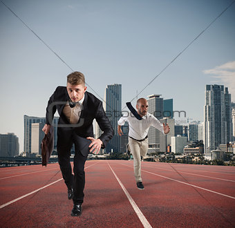 Businessman acts like a runner. Competition and challenge in business concept