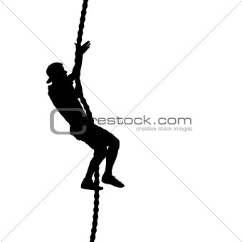 Black silhouette Mountain climber climbing a tightrope up on hands