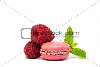 Pink raspberry macaroons, mint on white background