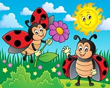 Happy ladybugs on meadow image 1