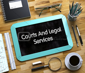 Courts And Legal Services - Text on Small Chalkboard. 3d