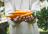 Fsrmer with Fresh carrots