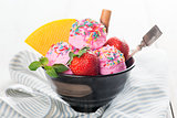 Strawberry ice cream with fruits in bowl