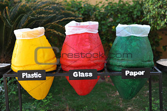 colored containers for recycling paper, plastic glass