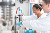 Researchers preparing test in scientific laboratory