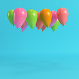 Colorfull balloons on bright blue background