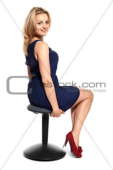 Attractive Woman Sitting on Stool