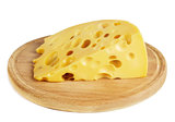 a piece of cheese with large holes lies on the board