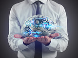 Man holds a brain with gears inside on his hands. 3D Rendering