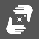 Nands and camera logotype. Human hands making a trimming symbol isolated on white.