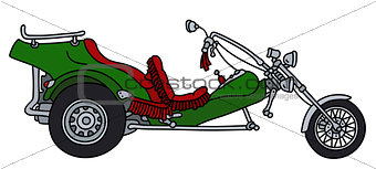 The green motor tricycle