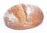 Freshly baked  loaf of bread with flour on white