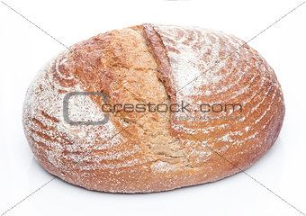 Freshly baked  loaf of bread with flour on white