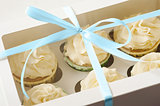 sweet present. gift box with cupcakes