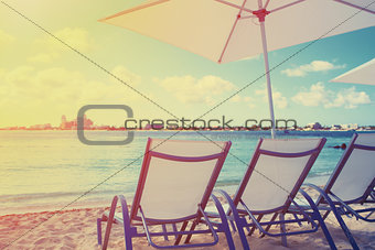 Deck chair on a beautiful beach during sunrise
