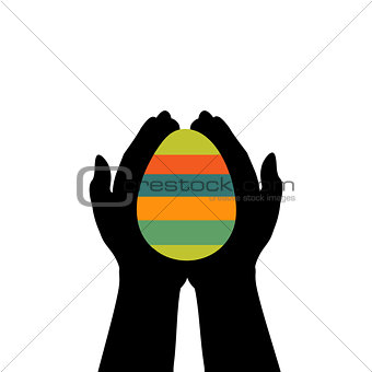 Hands hold easter egg colorful