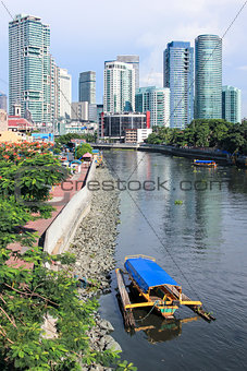 Passenger ferrys crossing pasig river Rockwell Manila
