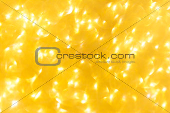 Gold bokeh blured background. Abstract sparkle glitter shiny holiday texture. Greeting card template. Copy space