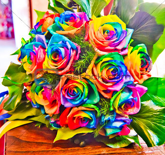 roses colored with the colors of the rainbow