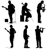 Silhouettes street musicians playing instruments on a white background