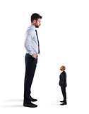 Small businessman terrified by his big boss