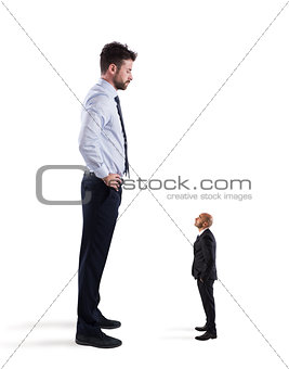 Small businessman terrified by his big boss