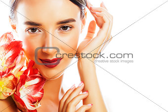 young pretty brunette woman with red flower amaryllis close up i