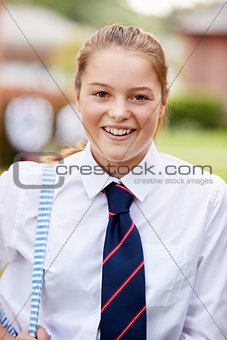 Portrait Of Female Teenage Student In Uniform Outside Buildings