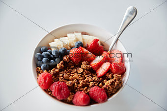 Bowl Of Granola And Fresh Fruit For Healthy Breakfast