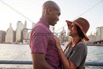 Romantic Young Couple With Manhattan Skyline In Background