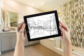 Hands Holding Computer Tablet with Master Bathroom Drawing on Sc