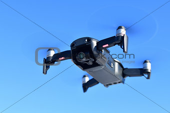 Black unmanned aerial vehicle with a camera