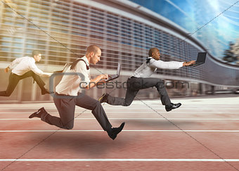 Business men working at full speed in a race track