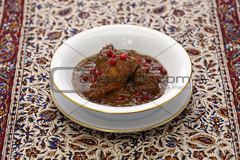 chicken fesenjan, pomegranate walnut stew, iranian persian cuisine