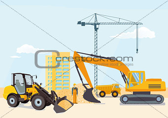 Excavator and wheel loader at the construction site