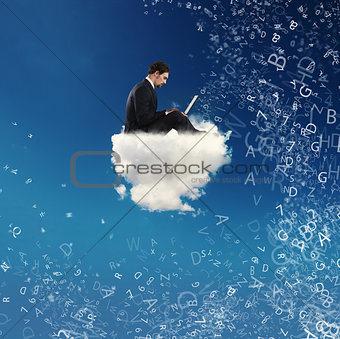 Businessman connected with his laptop over a cloud. concept of social network and internet addiction