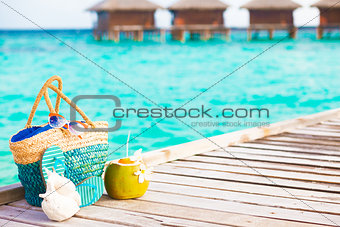 beach accessories on turquoise tropical background