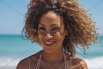 Beautiful ethnic woman in tropical sunshine