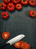 Marmande tomatoes and knife