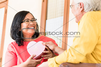 Asian senior couple in love smiling