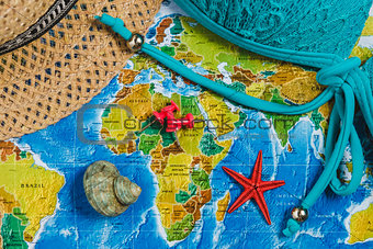 Travel Destination Points on World Map Indicated with Colorful Thumbtacks, Red Ribbon and Shallow Depth of Field.