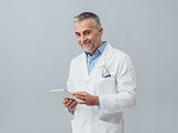 Doctor using a digital tablet