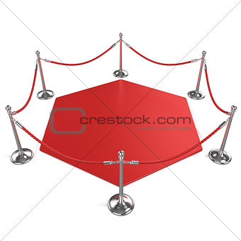 Red hexagon carpet surrounded with red rope and silver column