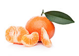 Fresh organic peeled mandarin fruit with leaves 