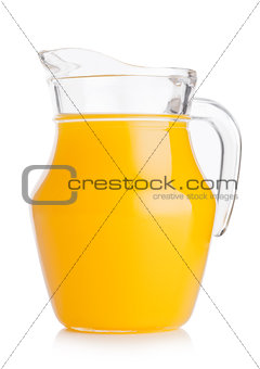 Glass jar of fresh orange juice with fruits
